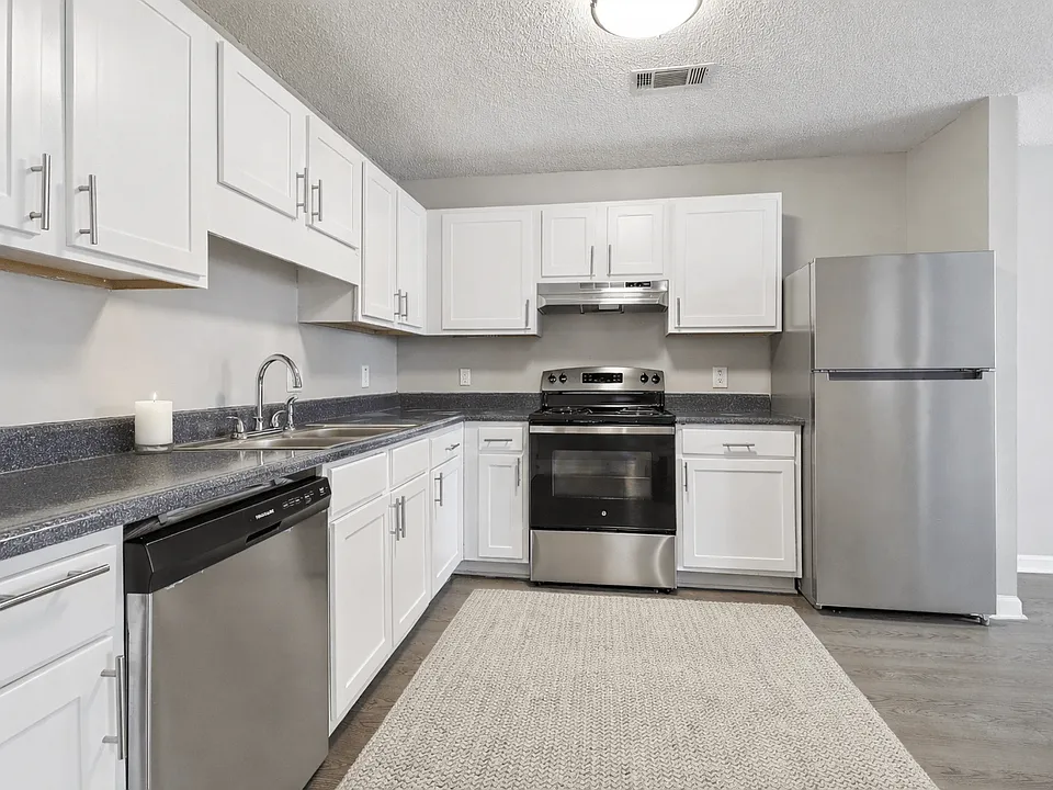 Cook with ease in updated kitchens with crisp white cabinetry and stainless steel appliances, professionally operated by Highlands Vista Group.
