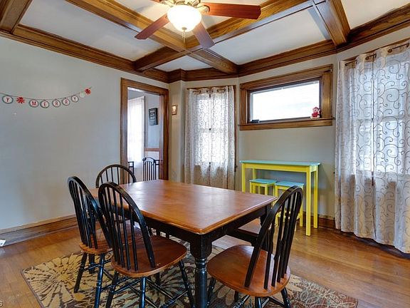 Dining Room with Hardwood Flooring and Ceiling Fan
