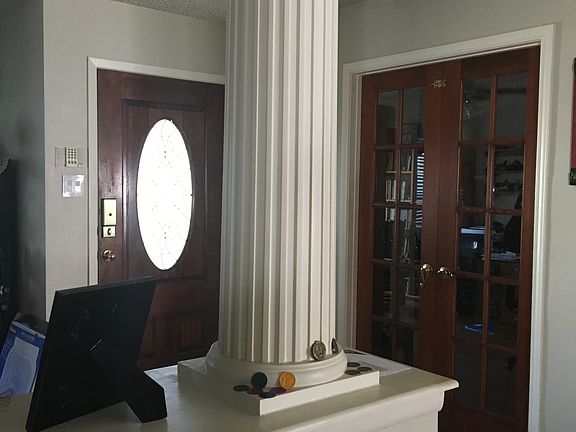 Entry. Office doors at right