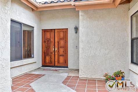 Enter your new home via a gated courtyard.
