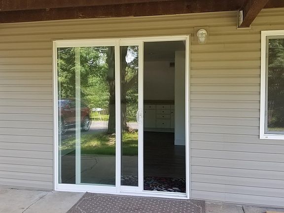 Lower level sliding door