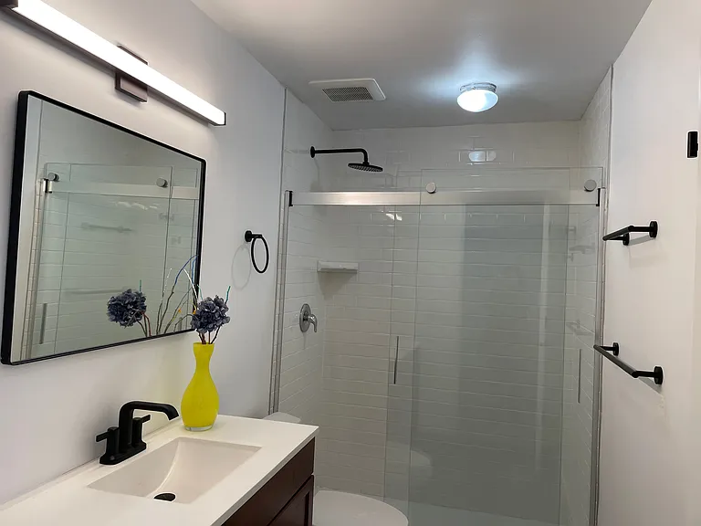 Bathroom with walk-in-shower.