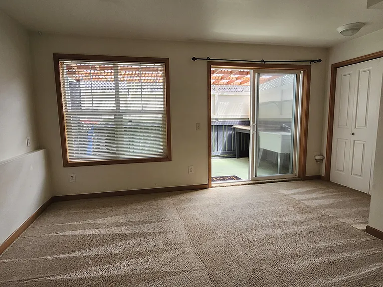 Downstairs bedroom/office or guest suite opens out to covered patio and separate entrance