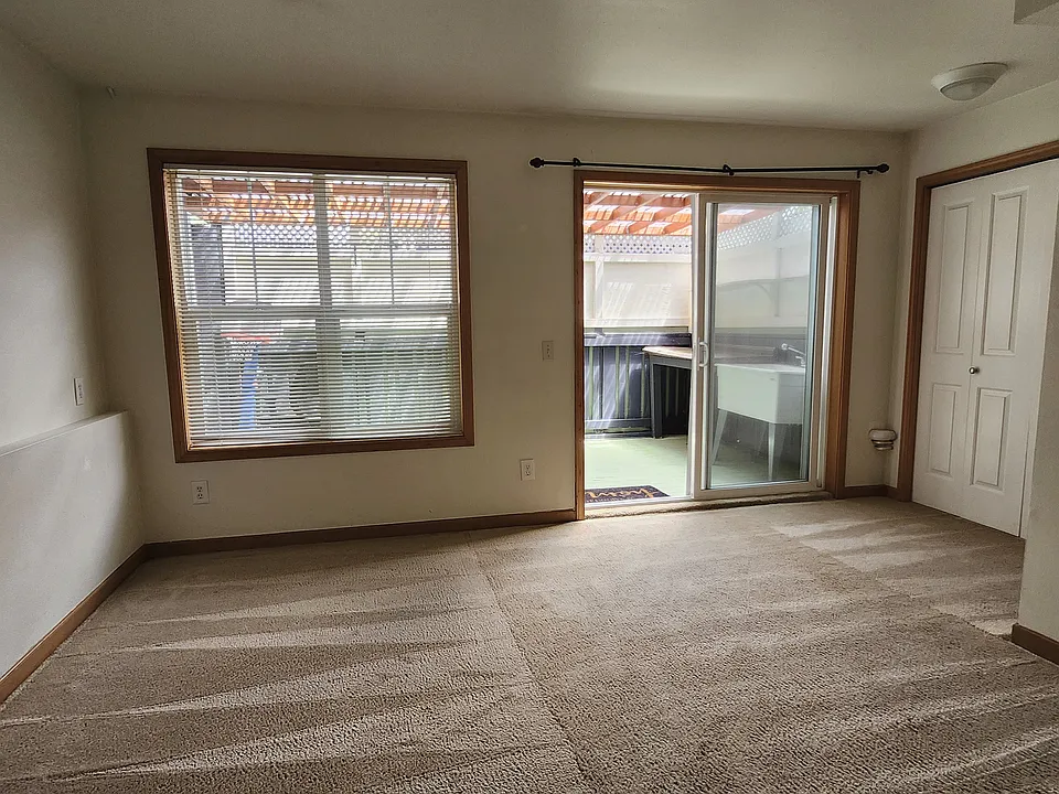 Downstairs bedroom/office or guest suite opens out to covered patio and separate entrance