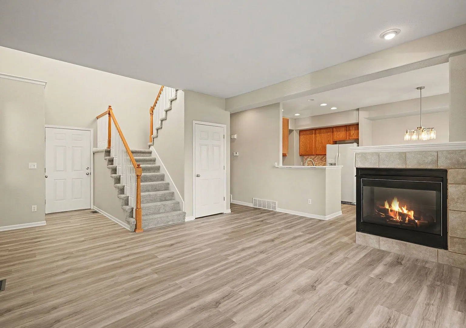 Beautifully Updated 3-Bedroom Townhome with Finished Basement, 2-Car Garage & Views — Photo 2