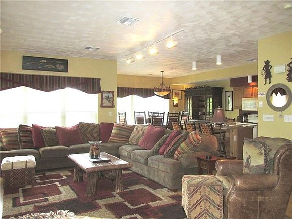 Space and natural light galore! You really need to zoom on these photos and see the attention to detail from wall fixtures to fu