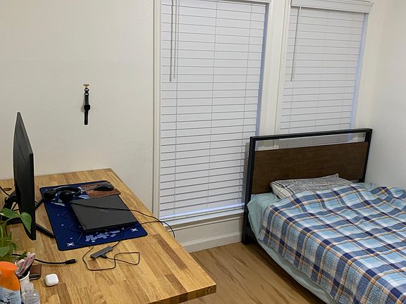Bedroom 1: Bed frame, mattress and motorized standup desk