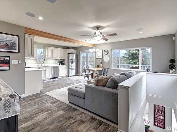 Enter into the Great Room where you can enjoy an open and versatile living space. Ceramic tile floors are beautiful and easy care. 