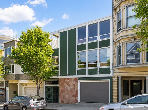 4131 24th Street, unit's windows are just above garage door in this photo