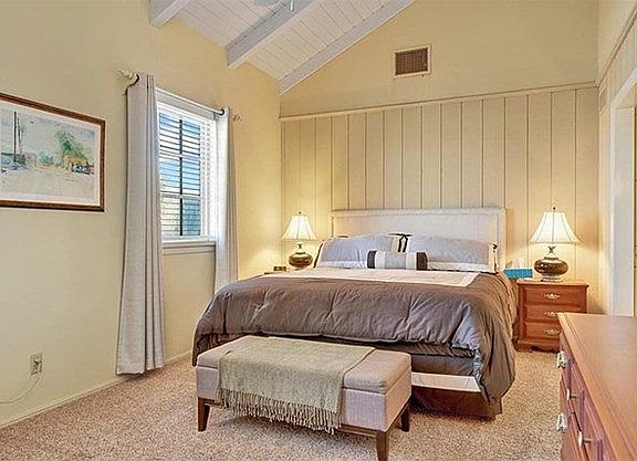 Master bedroom with vaulted ceiling and ensuite dressing room, shower, bath and separate private toilet