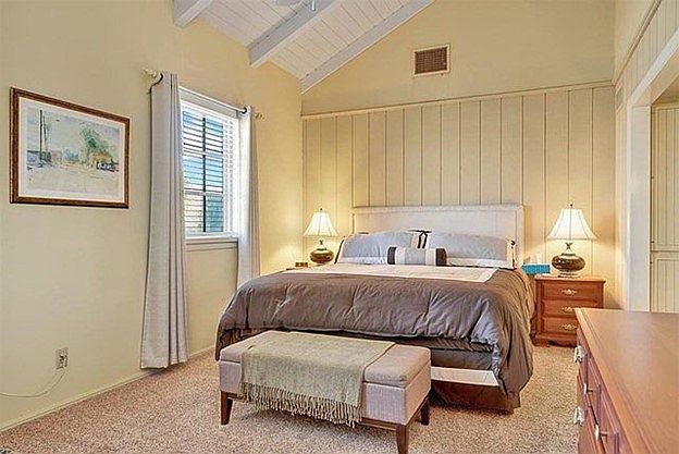 Master bedroom with vaulted ceiling and ensuite dressing room, shower, bath and separate private toilet