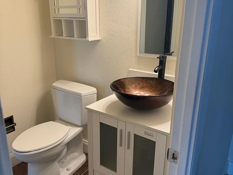Guest bath with door to separate from bedroom