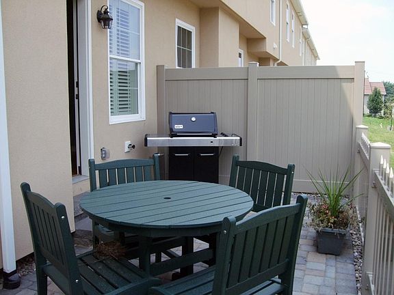 Enclosed patio space with privacy walls
