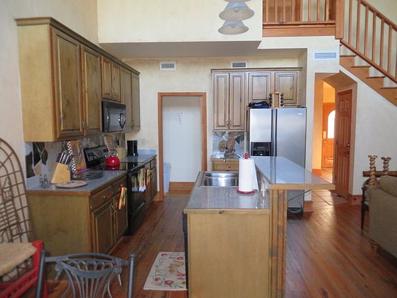 Kitchen
						:
						Updated galley kitchen with tons of space, pantry, eat-in bfast area