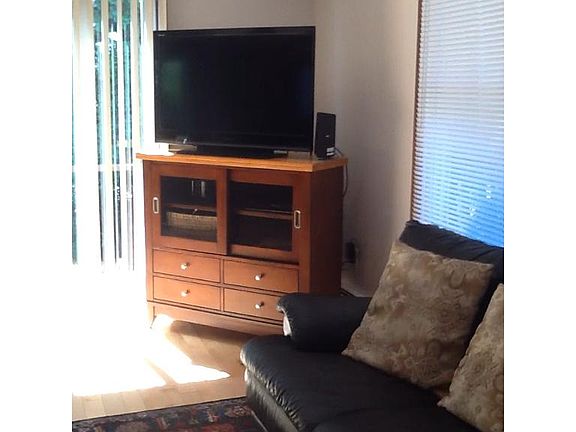 1st Floor Livingroom - TV, Entertainment Center, Love Seat