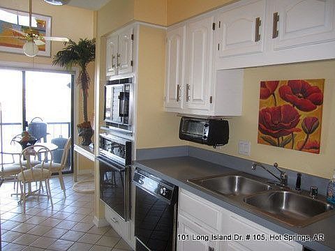 Kitchen flows out to patio for grilling