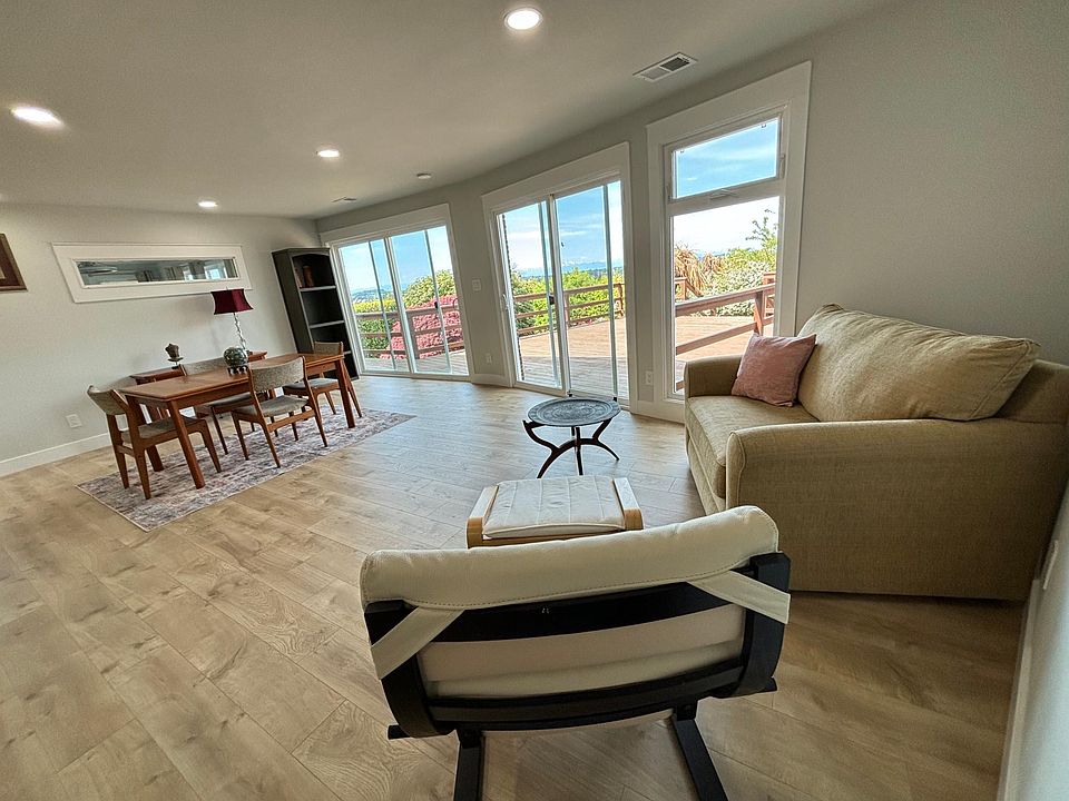 Secondary living area. The beige Lazy Boy sofa can convert into a twin sized memory foam bed.