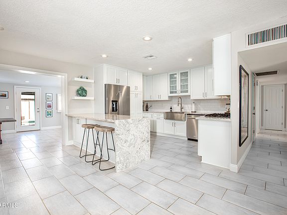 4th image of 8408 E LEWIS Avenue