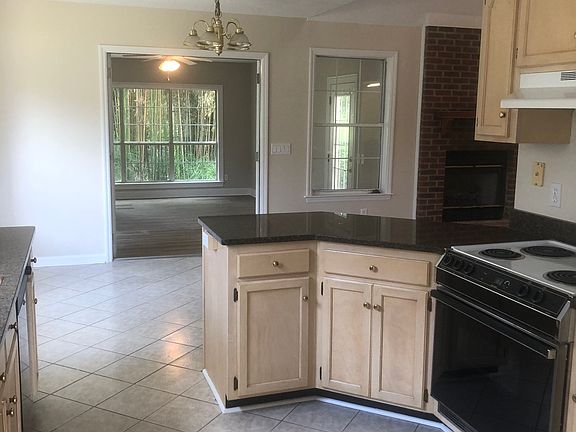 Kitchen looking into breakfast nook/bonus room.
