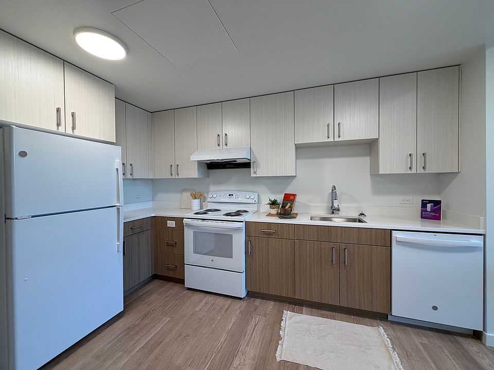 Kitchen with white appliances.