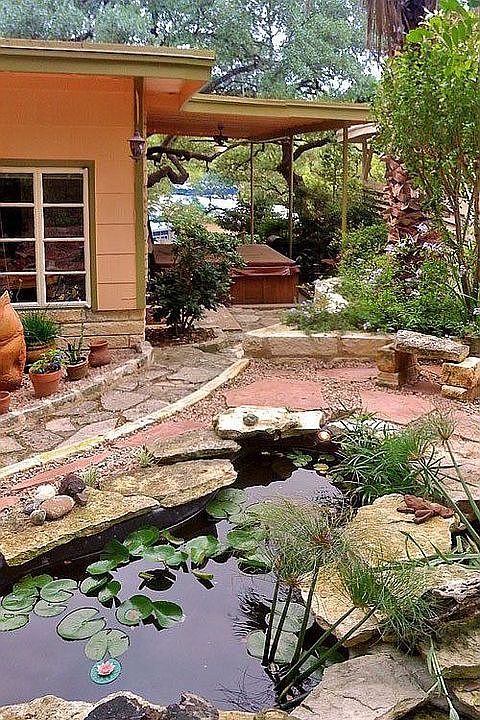 Backyard hot tub and pond
