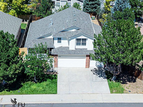 A three-car attached garage and wide driveway give you options for parking, storage, and everyday coming and going. Zillow