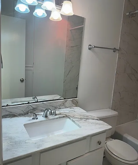 2nd bedroom bath with storage