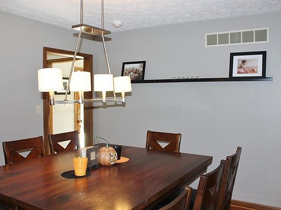 Formal dining room with hardwood floors
