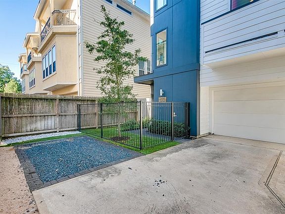 Extra private parking space right by the property. This will be conveyed with the home sale. The area can be converted into extra yard space.