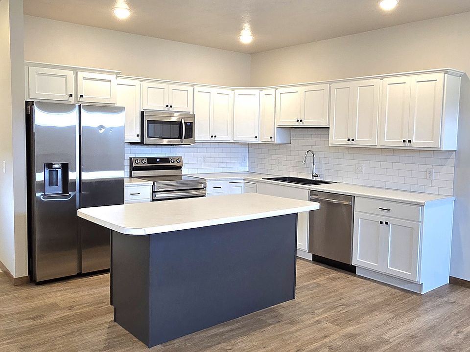 Island, double sink and lots of counter space.