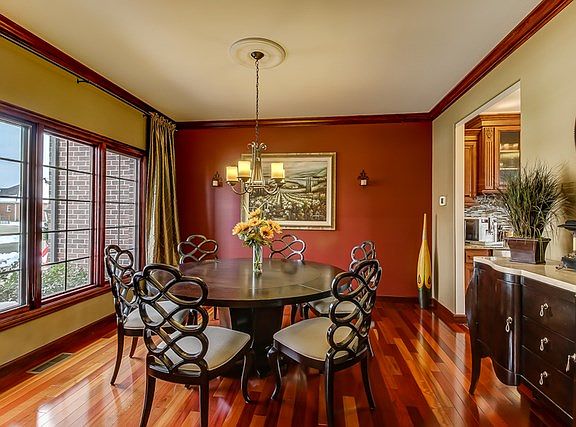 Features Brazilian hardwood floors and crown molding