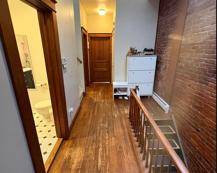 2nd floor hallway. to your left is the bathroom. End of the hall is the stairs up to the loft, the 2nd bedroom and the nursery. To the right is the laundry "room" with brand new washer/dryer. + skylight up above