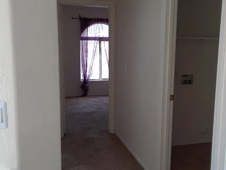 entry to laundry room /right /upstairs
- view to one of the bedroom