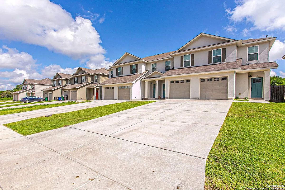 Building Photo - 6311 Melanzane Ave #1