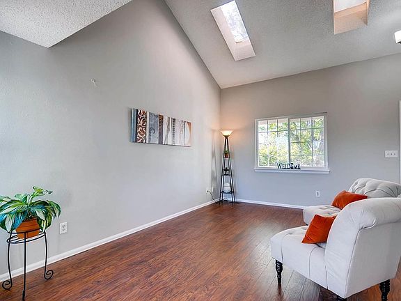 Step into the Spacious Living Room with soaring, Vaulted ceilings.