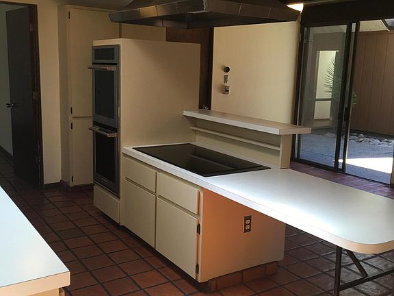 kitchen facing family room and atrium