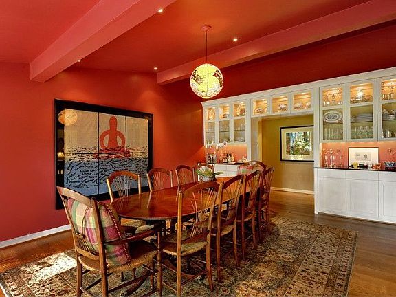 Showstopper dining room with custom cabinets and glass countertop!