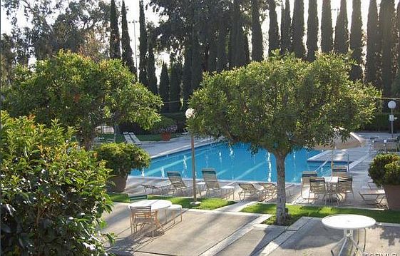 1 of several pools in the community. The one is located across the street from the unit.