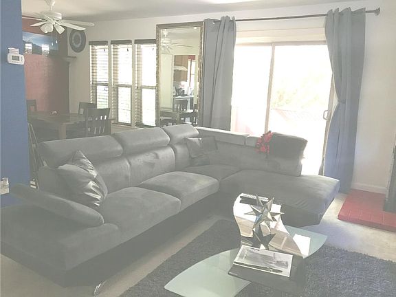 private living and dining room overlook the filter trees 