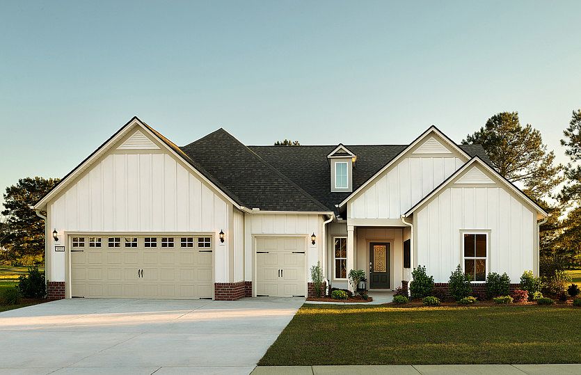 Dunwoody Mode Home at Twilight with brick accent.