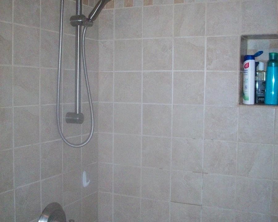 upstairs tile shower and whirlpool tub.