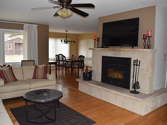 Living room furnished and dining room.
