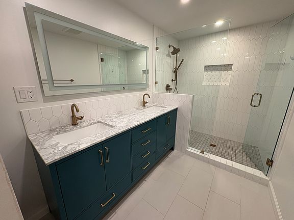 Brand new custom en-suite master bathroom with over-sized shower and double-vanity.