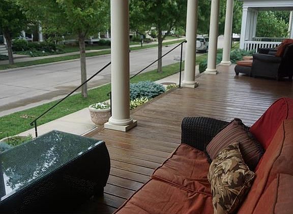 Come sit & have an iced tea on the veranda with me. We'll visit with the neighbors when they walk Fido.