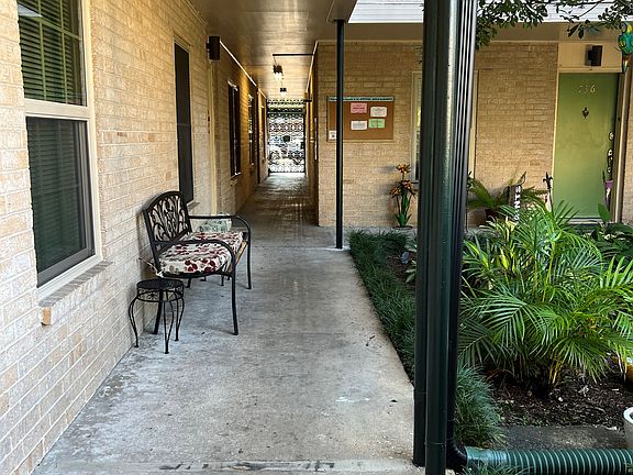 view standing out side front door looking straight at main entrance gate