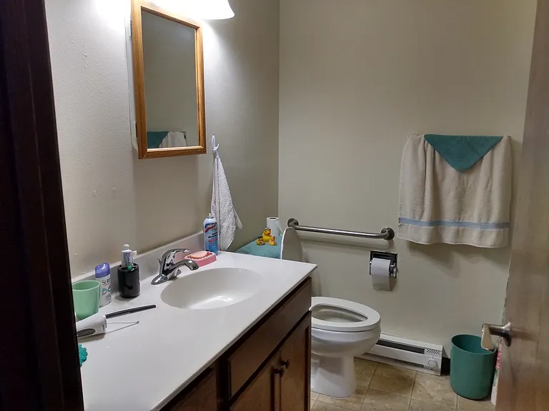 These photos are from an occupied unit. This is not a furnished apartment.