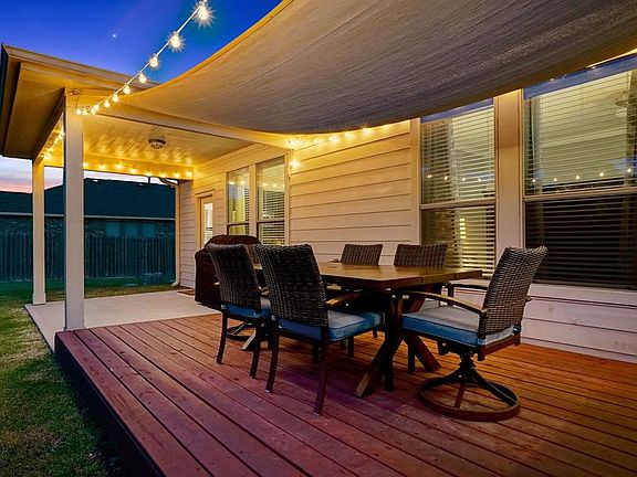 The back porch has been expanded to accommodate even your largest crowds.