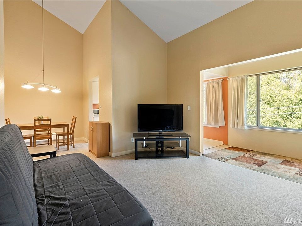 Family room, dining room and closed in sunroom 