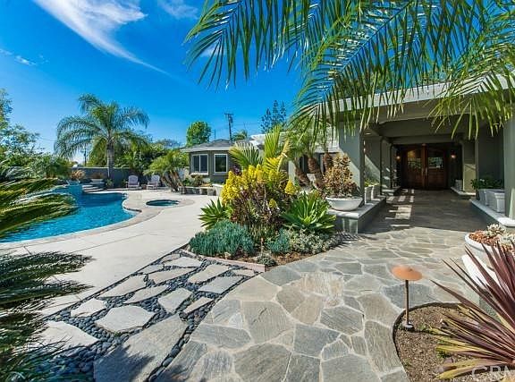 Behind the gated exterior you will find peace and serenity in these captivating surroundings.