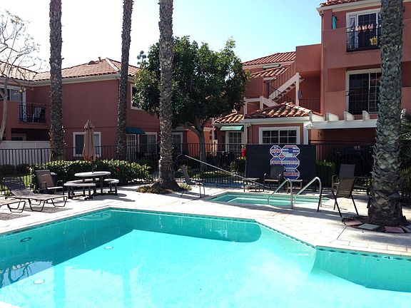 Heated Pool & Spa, property located behind tree.